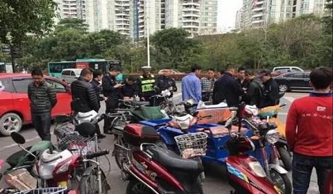 深圳“禁摩限电”引风波   快递怎么办？